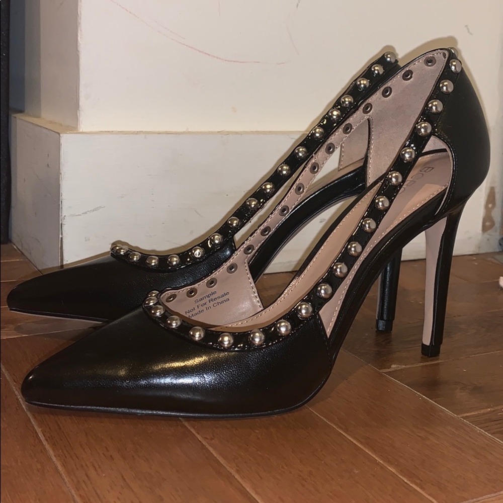 BCBGeneration black studded pumps. Size 7.